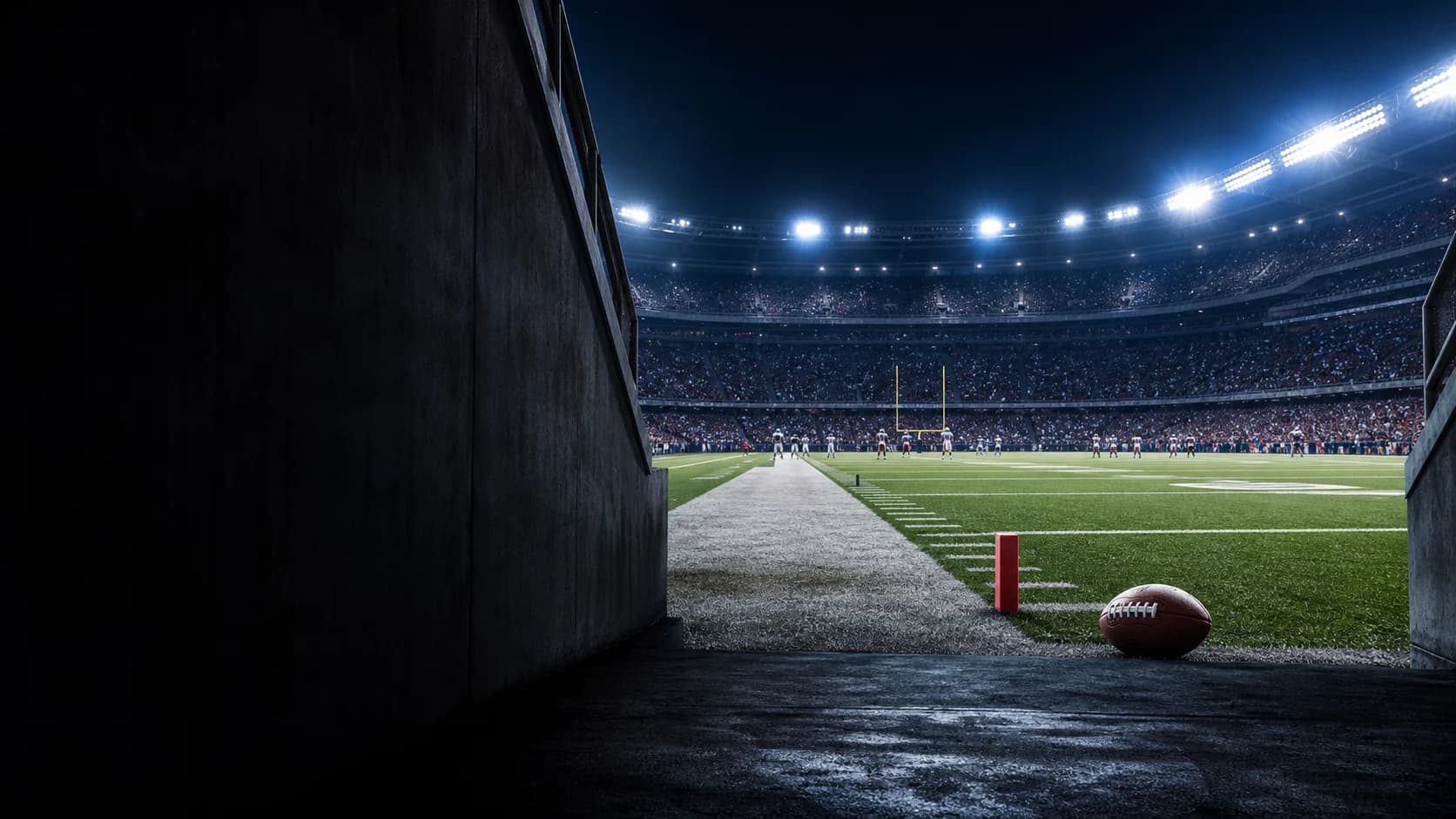 American football stadium viewed from the player tunnel